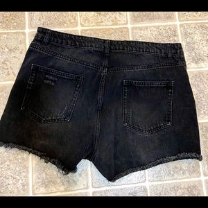 Woman’s black, high-rise short